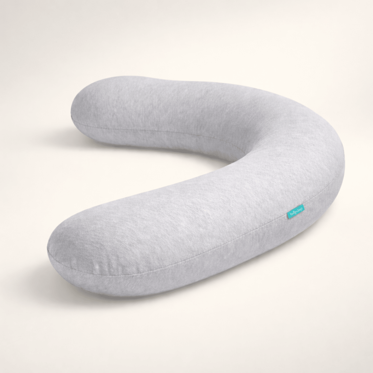 Full-length pregnancy body support pillow providing ergonomic comfort and spinal alignment for restful sleep