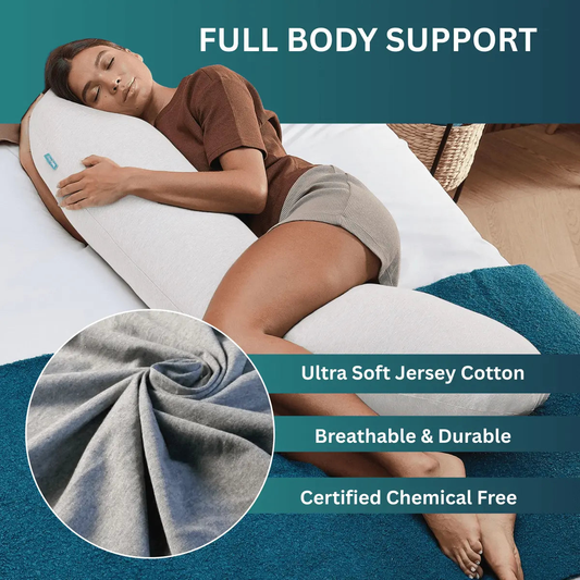 Woman sleeping with ergonomic full body pillow, ultra soft jersey cotton, chemical free, breathable and durable.