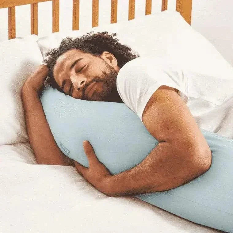 Cooling body pillow with breathable TENCEL lyocell cover and hollowfibre filling for full-body support and temperature regulation