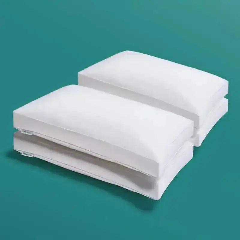 Set of four ergonomic white pillows with clean edges on a teal background