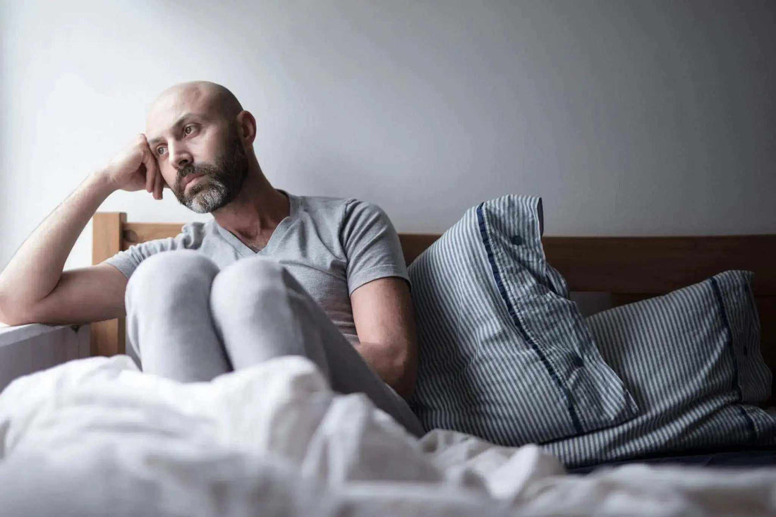 woman sleeping on an elevated wedge pillow to relieve acid reflux symptoms at night