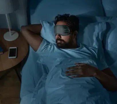 man sleeping in the dark