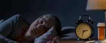 Older adult peacefully sleeping in bed illustrating sleep changes as we age